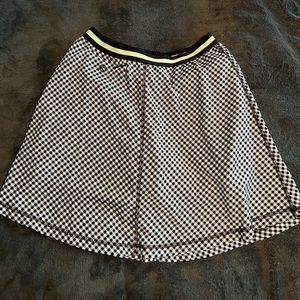 Cute black and white plaid golf,tennis or running skirt with built in shorts